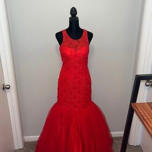Red, fully body prom/homecoming dress. Only worn once for 2 hours.